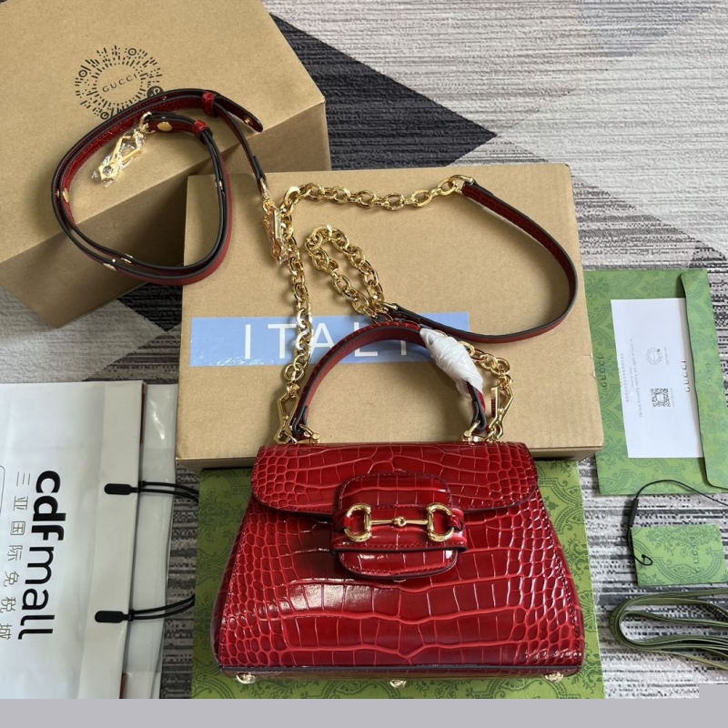 G*u*i top handle bags